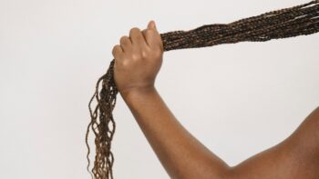 Hair idioms - A person pulling their own hair