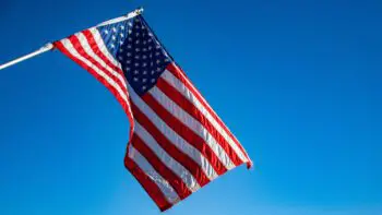 American idioms - the American flag with a blue sky backgroud