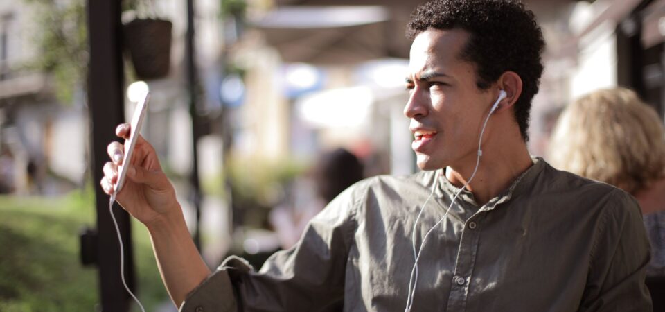 man using the best language exchange apps to learn english