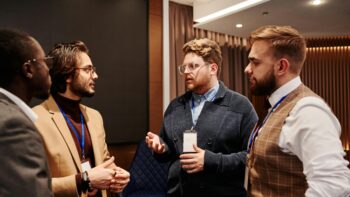 people discussing small talk tips at a work event