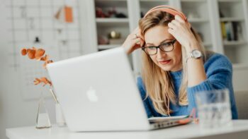 Person listening to how American English speech sounds in a TV show