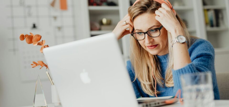 Person listening to how American English speech sounds in a TV show