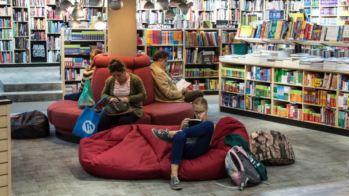 people read to learn english in a book shop